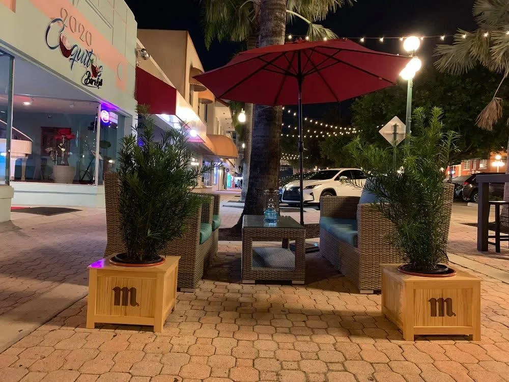 Downtown restaurant patio illuminated in the evening